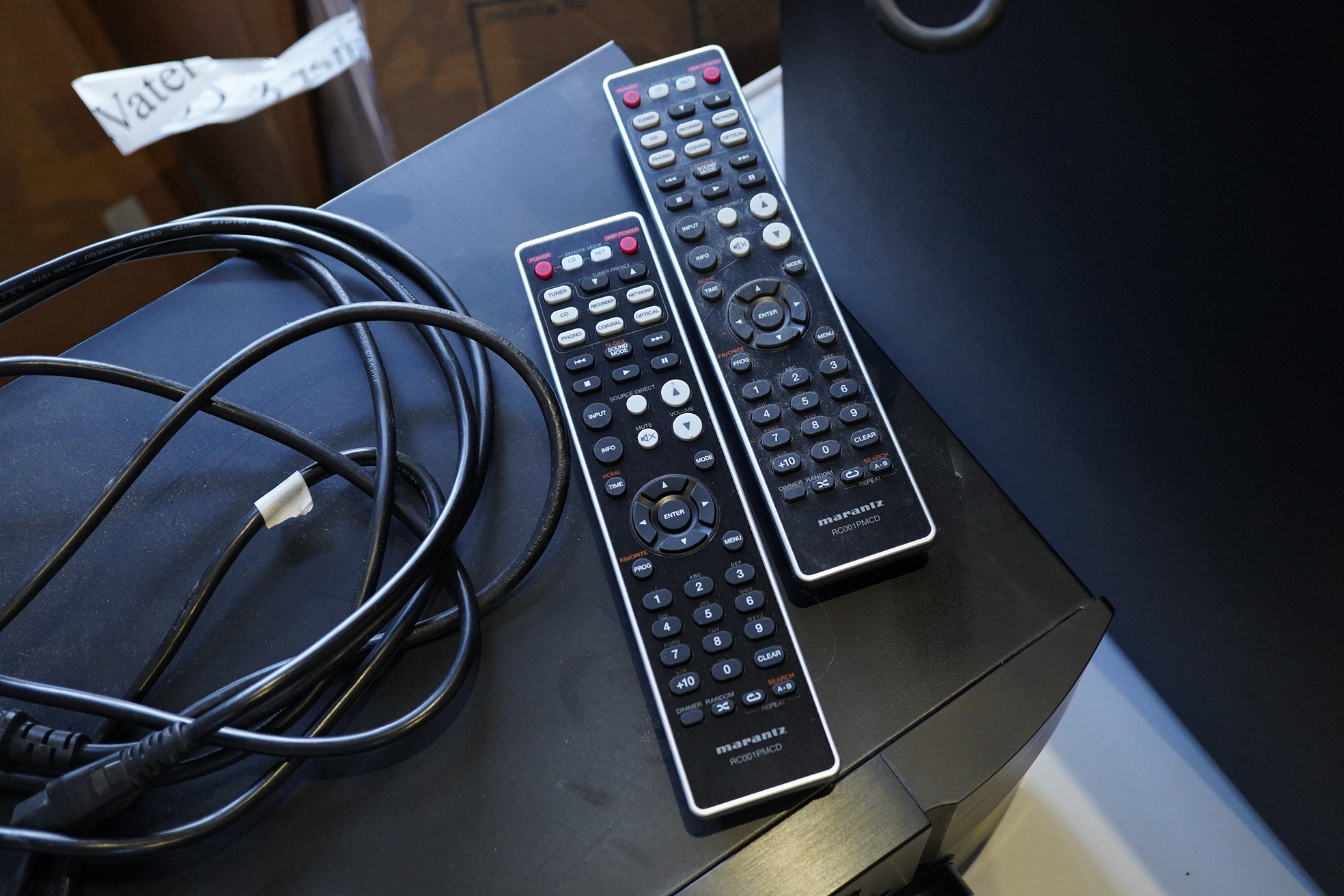 A Marantz HiFi integrated amplifier PM6005, together with a CD player CD6005, plus two remote controls and power leads